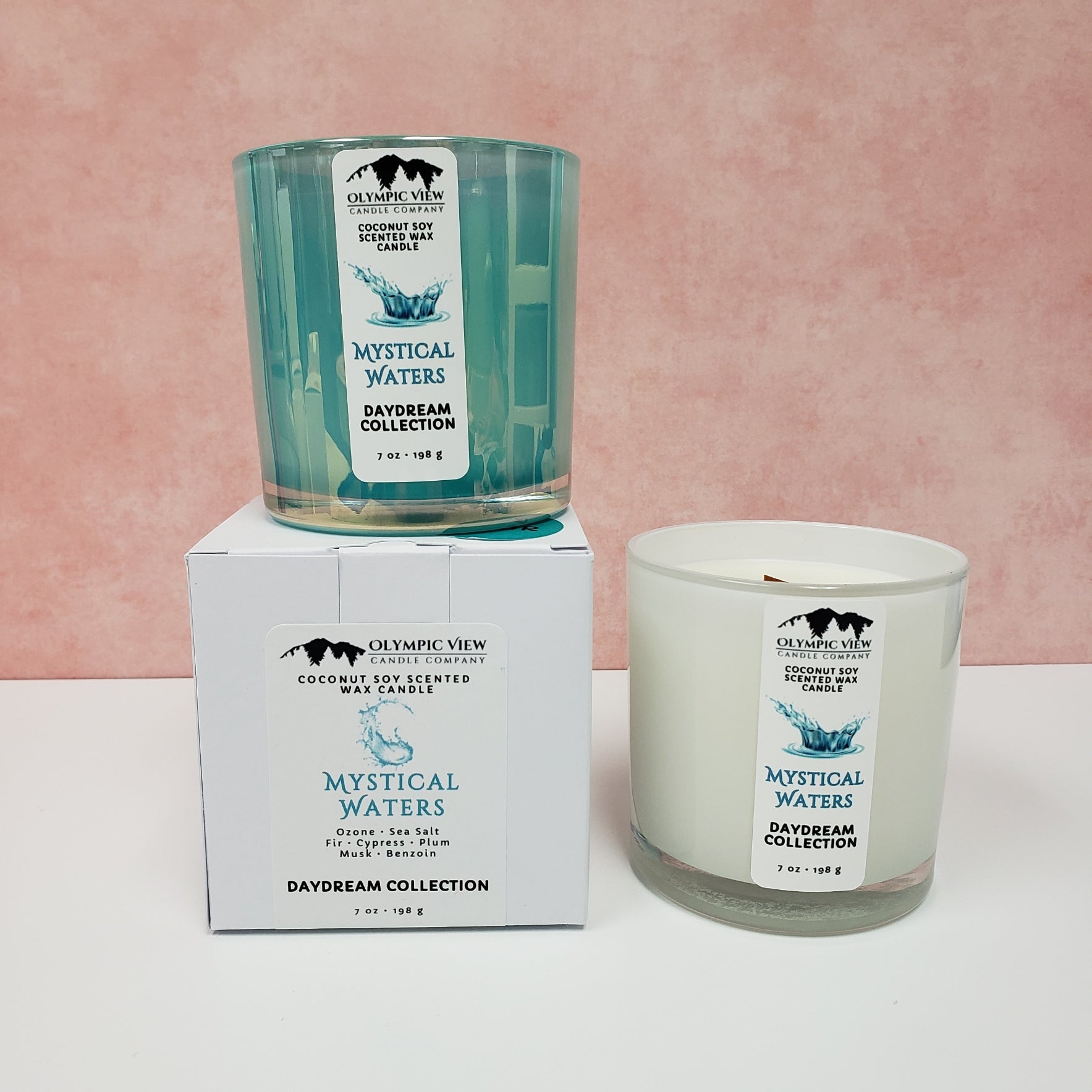 Mystical Waters wooden wicked candles in a Mermaid Teal and Milk White jar. They come in a white matte box. Hand poured by Olympic View Candle.