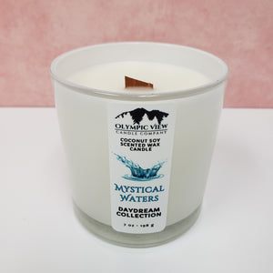 Mystical Waters wooden wicked coconut soy candle in milk white jar.