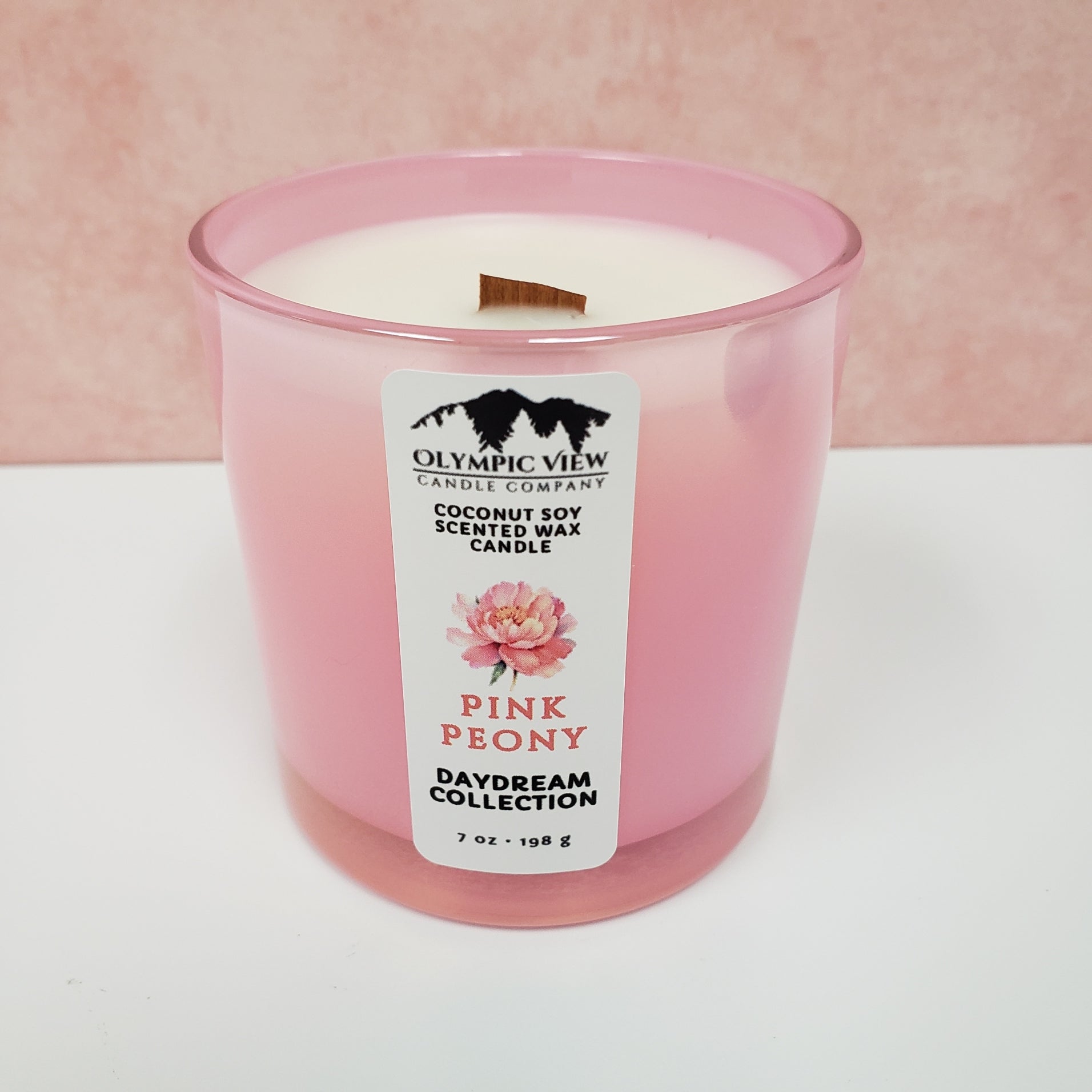 Pink Peony wooden wicked candle in a Unicorn Pink jar.  Hand poured by Olympic View Candle.