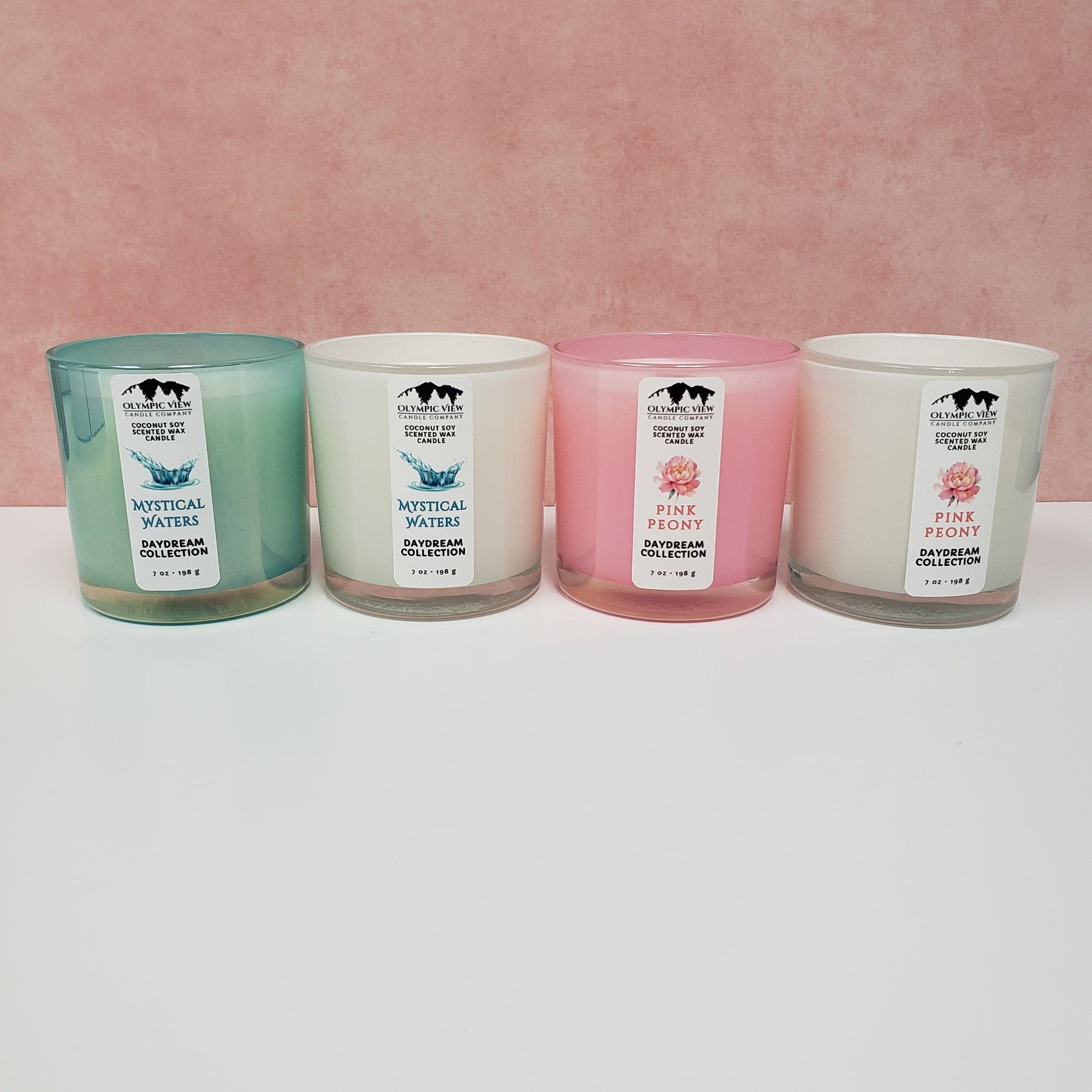 4 jars of our Daydream Collection including Pink Peony and Mystical Waters.  Candle jars are in Mermaid teal, milk white, and Unicorn pink.